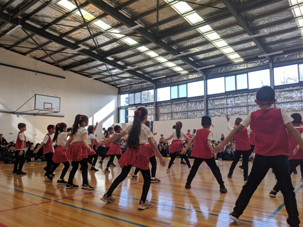 KINECT students dancing at a school concert event